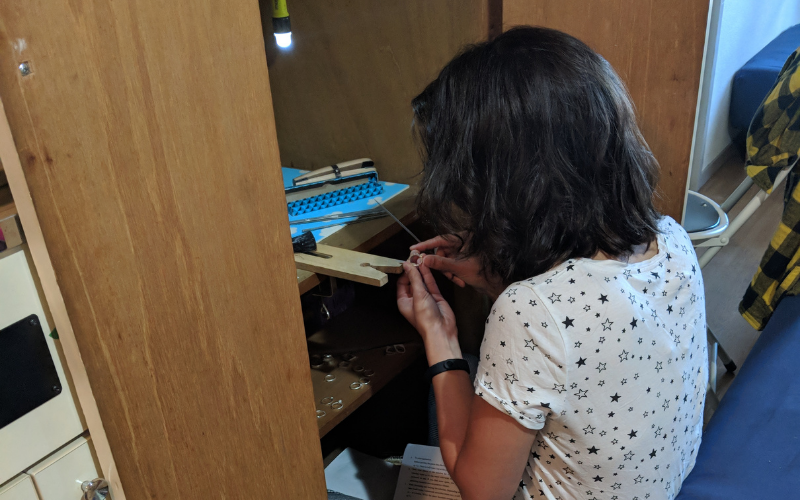 Jewellery bench at a closet shelf