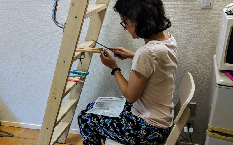 Jewellery bench at a ladder that leads to a loft