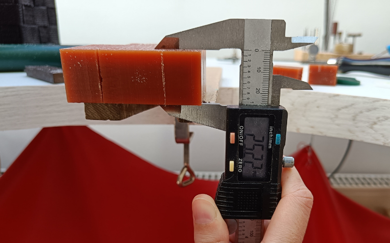 callipers measuring a wax block 25.22mm