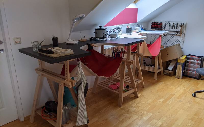 2 Ikea desks converted into jewellery benches next to each other