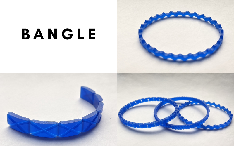 Bangle: a full wavy bangle, a half bangle divided into seven pieces with a cross over the front, stack of 3 full bangles, 1 wavy, 1 rough and 1 with drill holes. All from wax