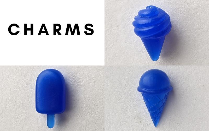 Charms: one soft serve ice cream, one ice lolly and one single scoop ice cream. ALl made from blue wax