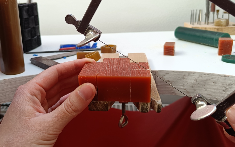 wax block with a very angled saw