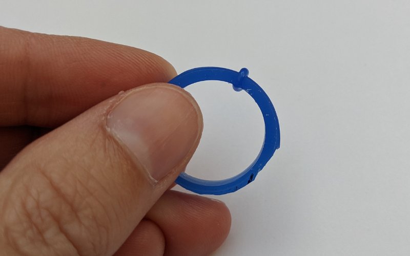 Blue wax ring with blob 