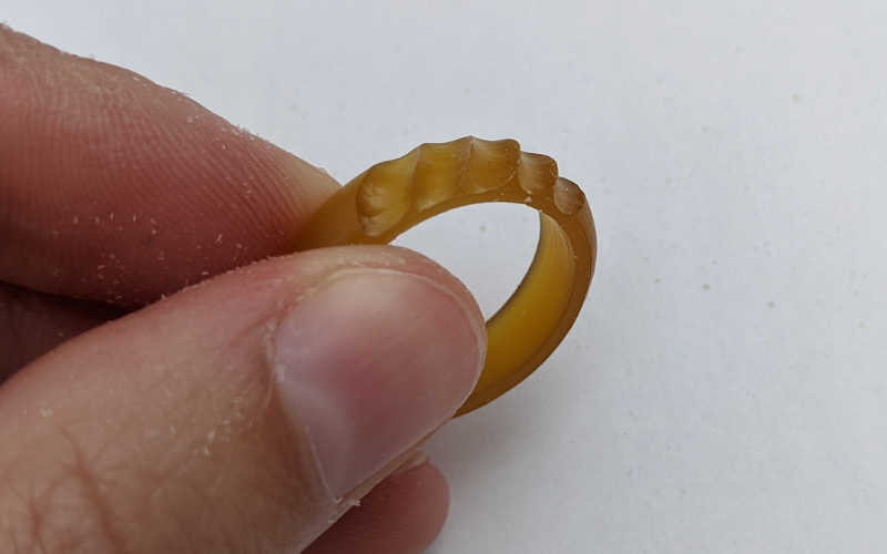Ring with burred grooves