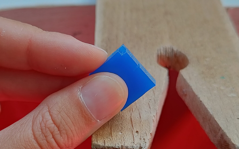 Piece of wax with a section of the corner cut down