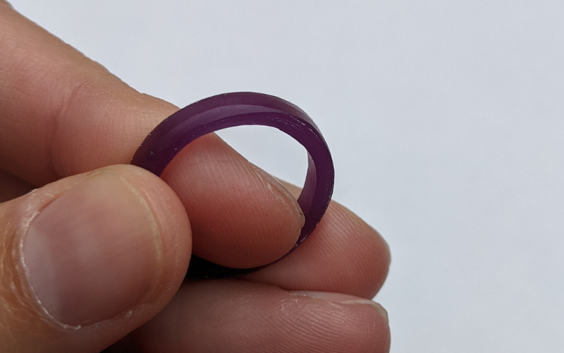 Purple wax ring with the start of a court shape filed into it