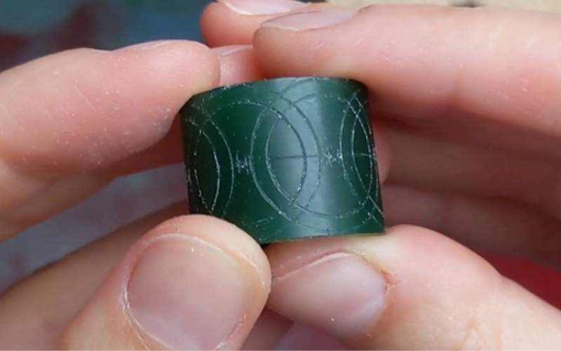 Green wax ring blank with and interlocking circle pattern marked on it