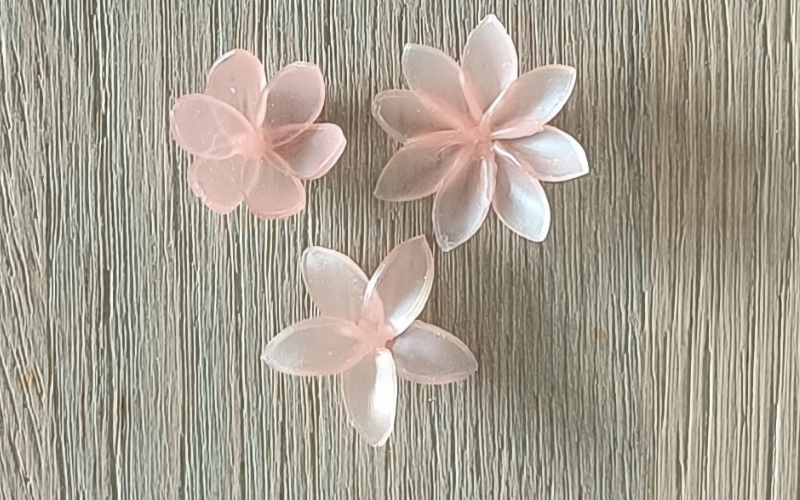 3 different flower shapes from pink sheet wax. All have marquise shaped petals 