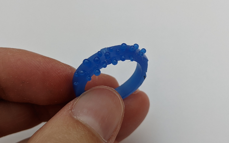 Blue wax ring with granulation