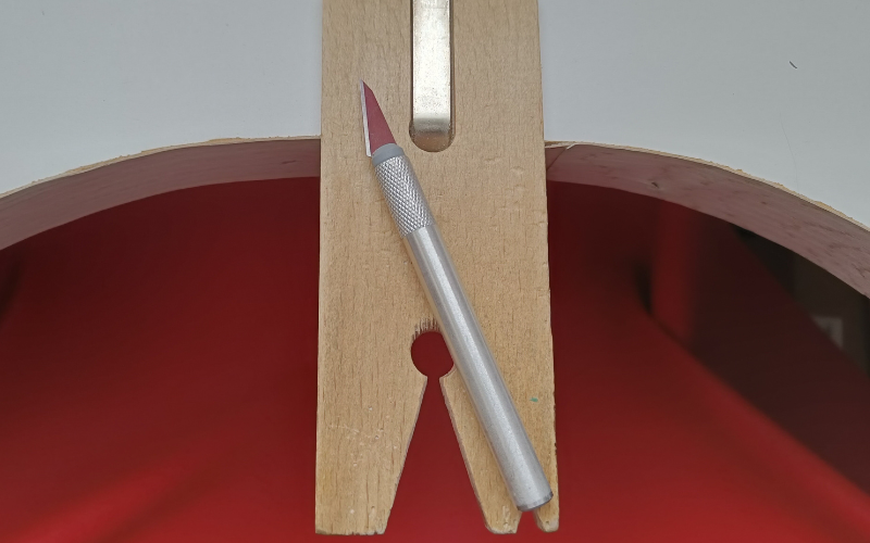 Stanley knife on a bench peg