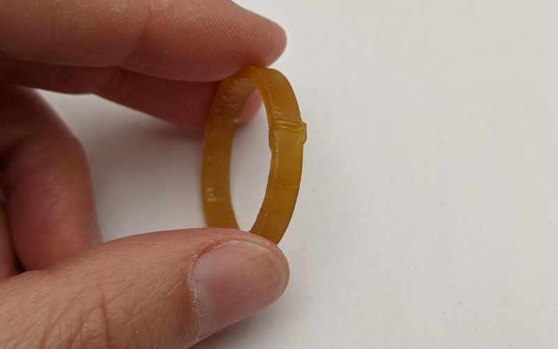 Gold wax ring with blob of wax over a break