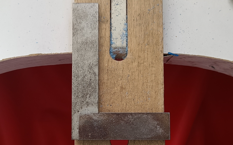 Bench peg with a set square on it 
