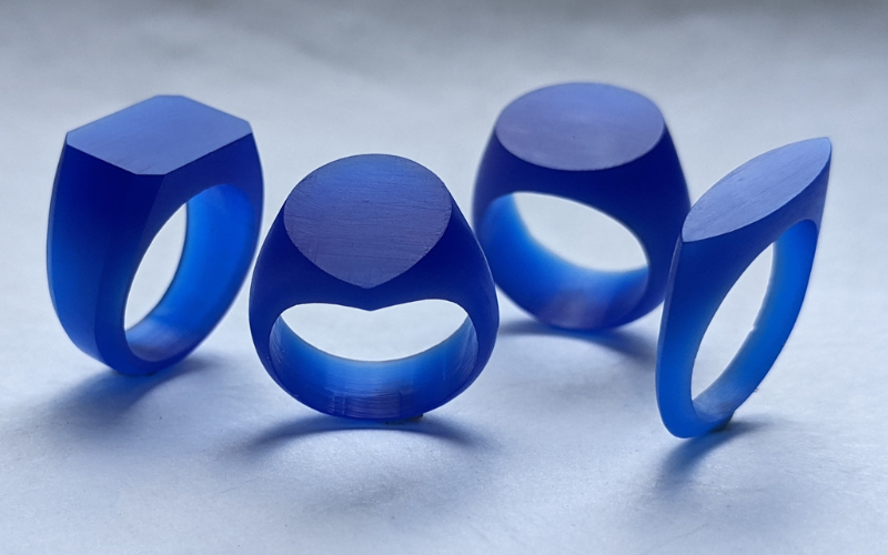 4 signet rings from blue wax: Octagon shape, pear shape, round shape and marquise shape.