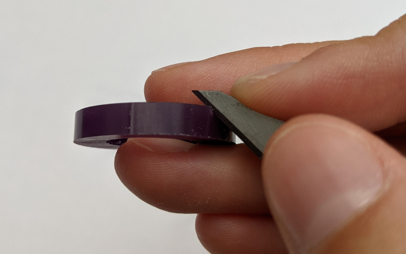 Purple ring with stanley knife in it 