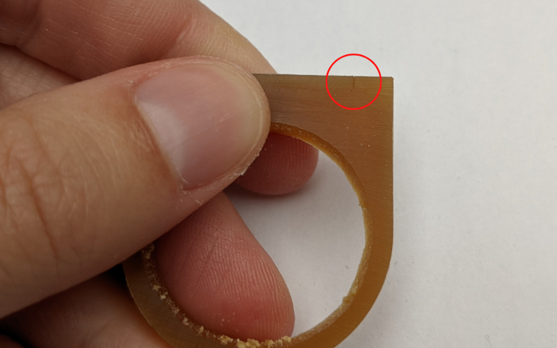Gold ring with stanley knife mark