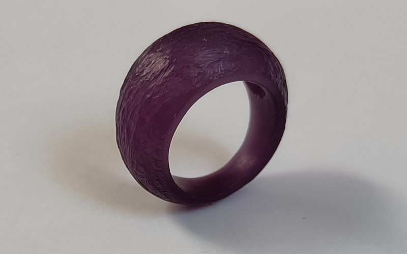 bombe ring from purplpe wax with a coarse texture from a wax file